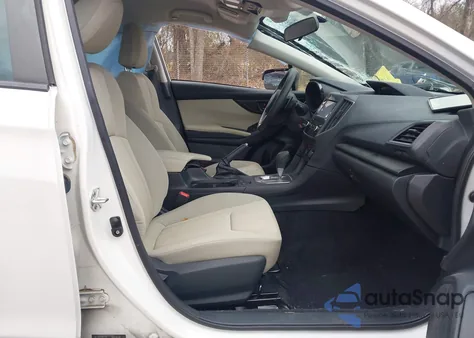 2021 Subaru Impreza Premium 5-Door z USA, uszkodzony, nr VIN 4S3GTAV60M3716054